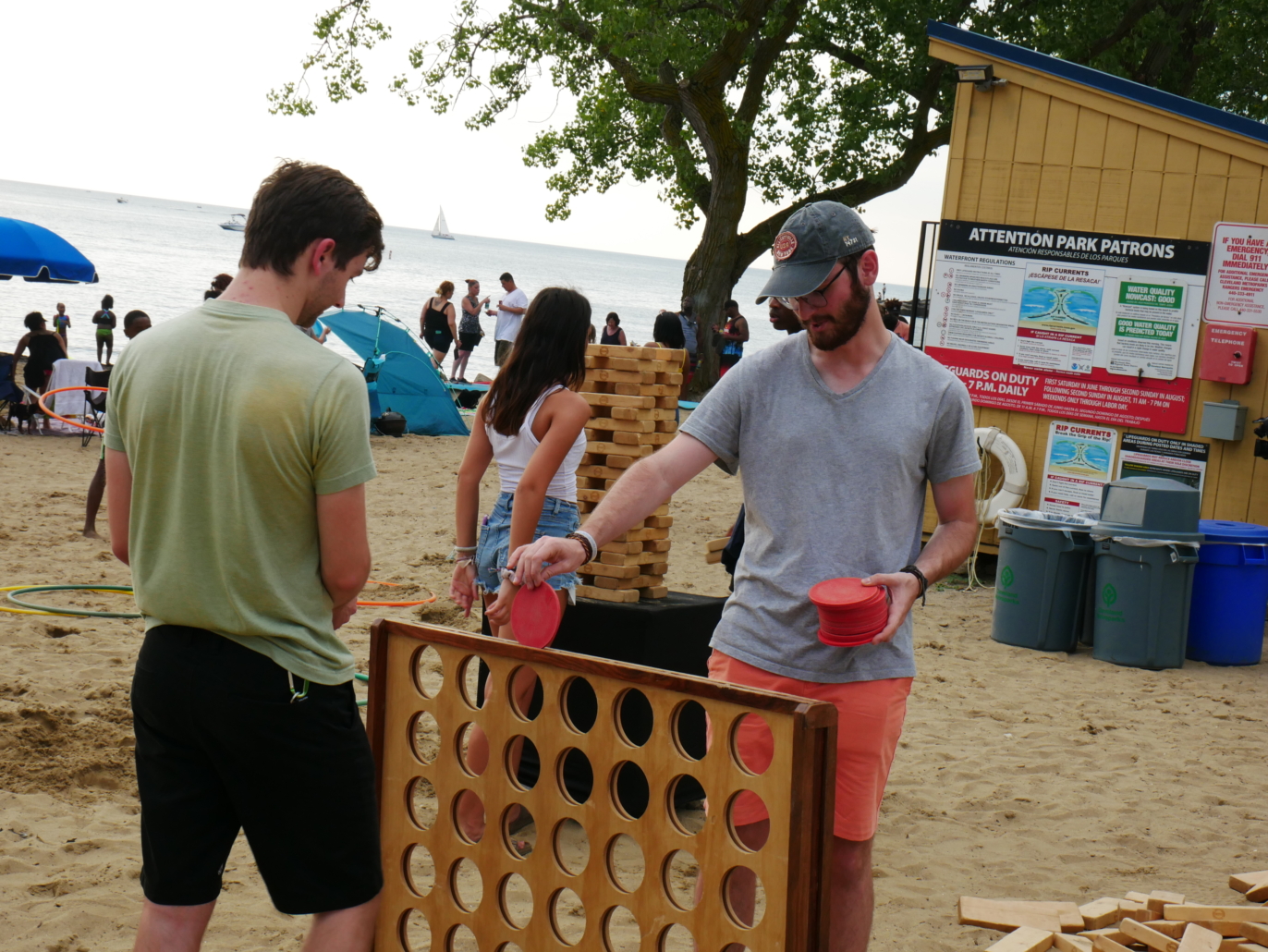 Image of two men playing Giant Connect 4